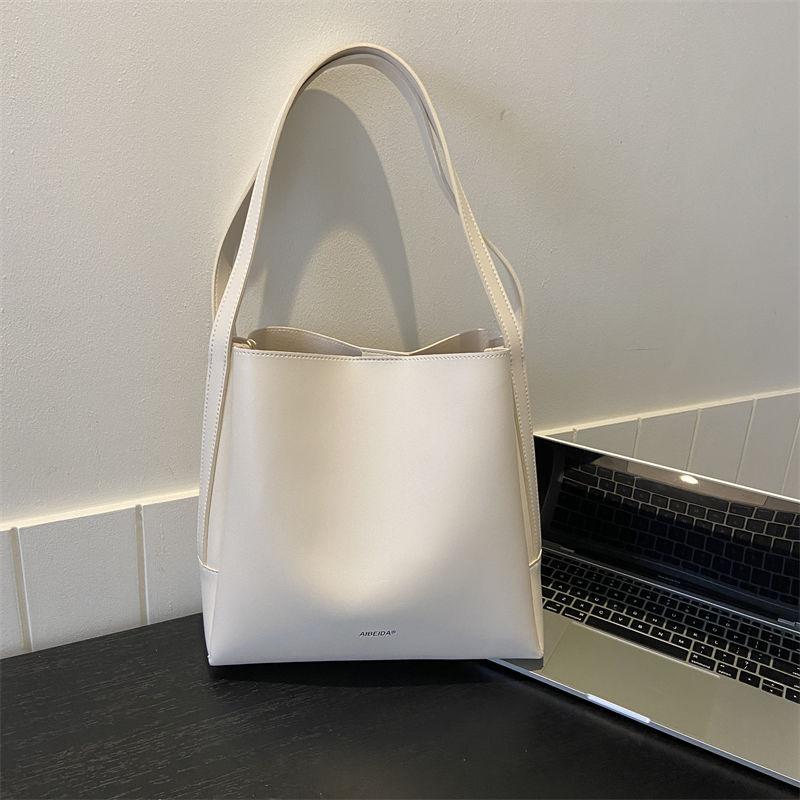 

New retro bucket bag versatile shoulder mother and child bag explosive French large-capacity commuting simple portable tote bag білий