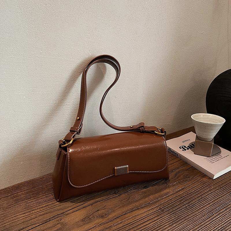 Crossbody bag women s niche baguette bag 2026 new Korean fashion retro commuter shoulder armpit bag коричневый
