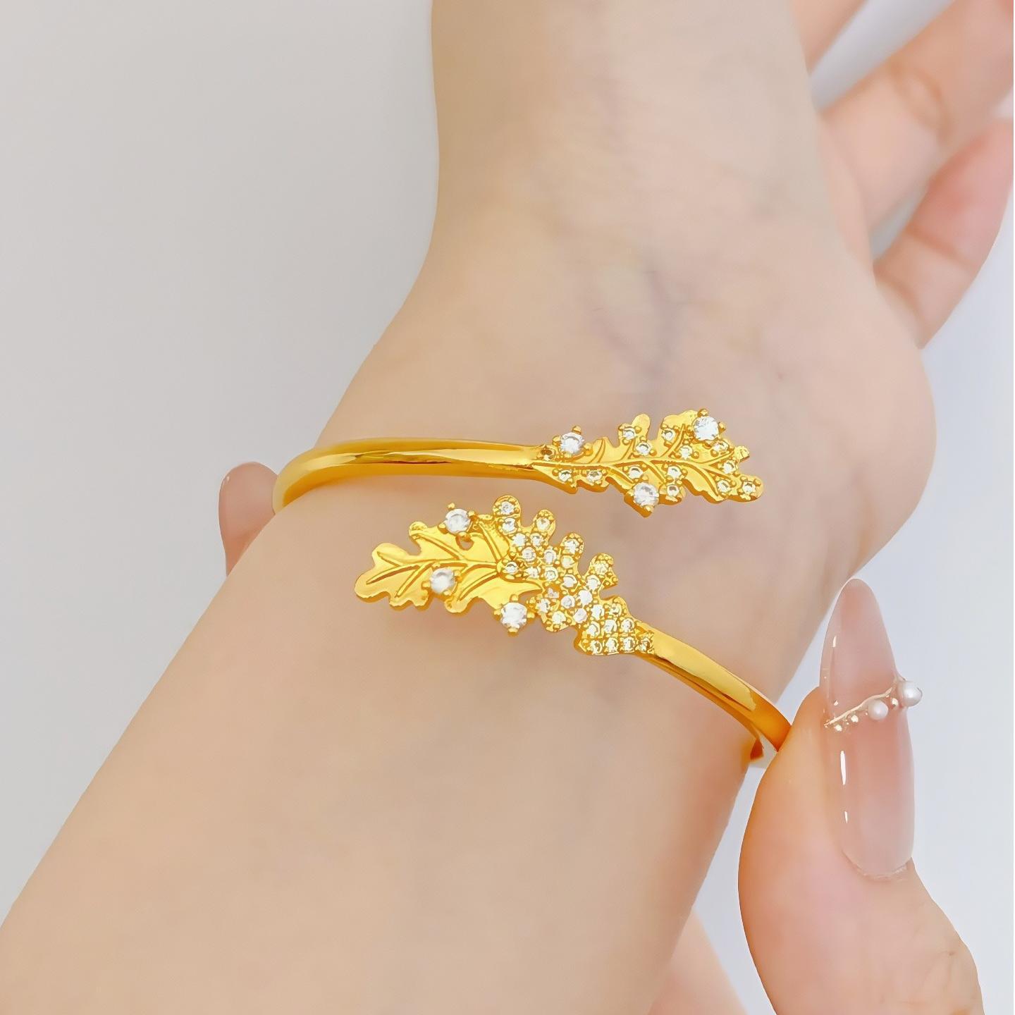 

Позолоченный браслет-манжета Centella Asiatica с бриллиантами и листьями, покрытыми снегом - Роскошный женский браслет