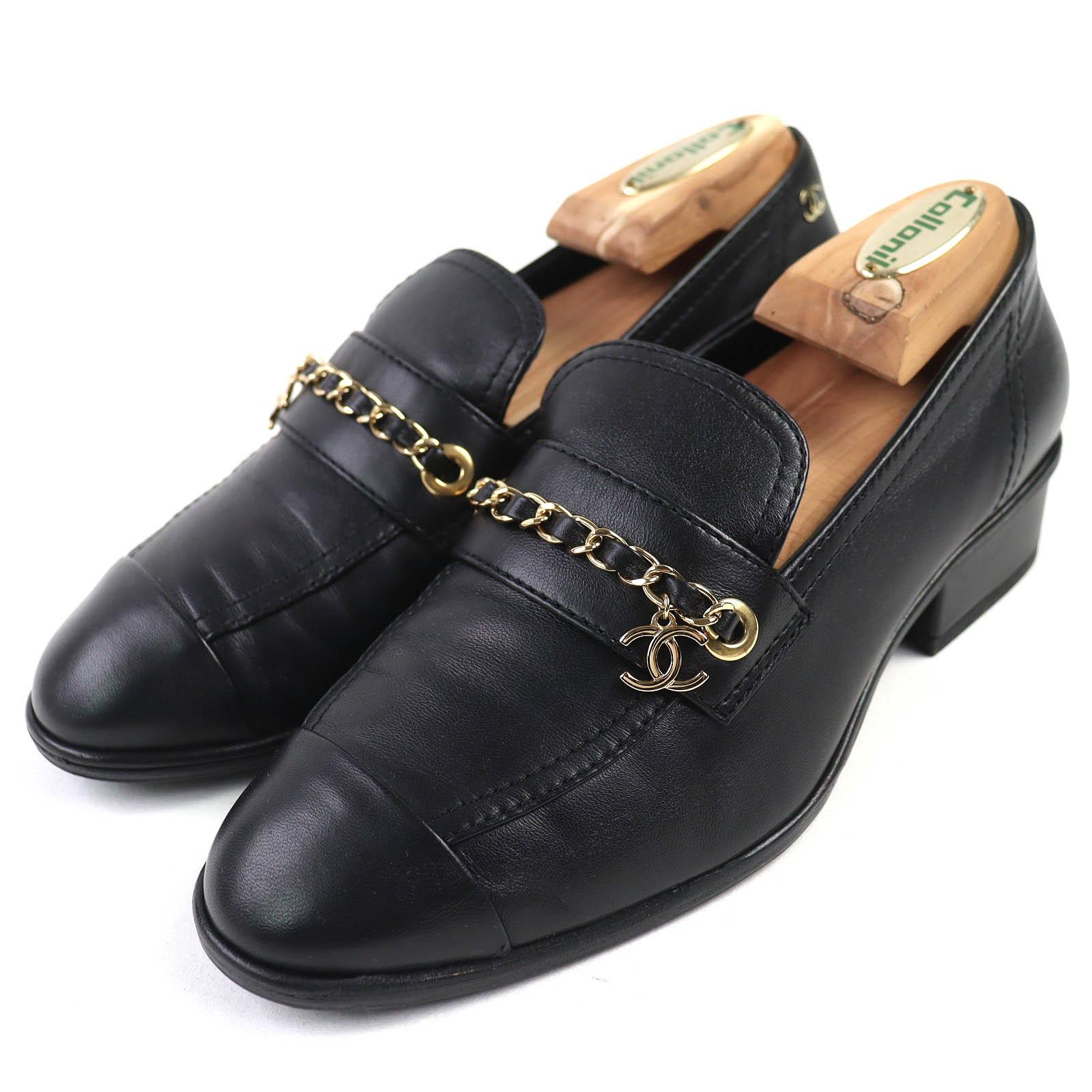 

Чудові лофери CHANEL Шкіряні з підвіскою-логотипом COCO чорна шкіра 35.5 G38559 Вживані