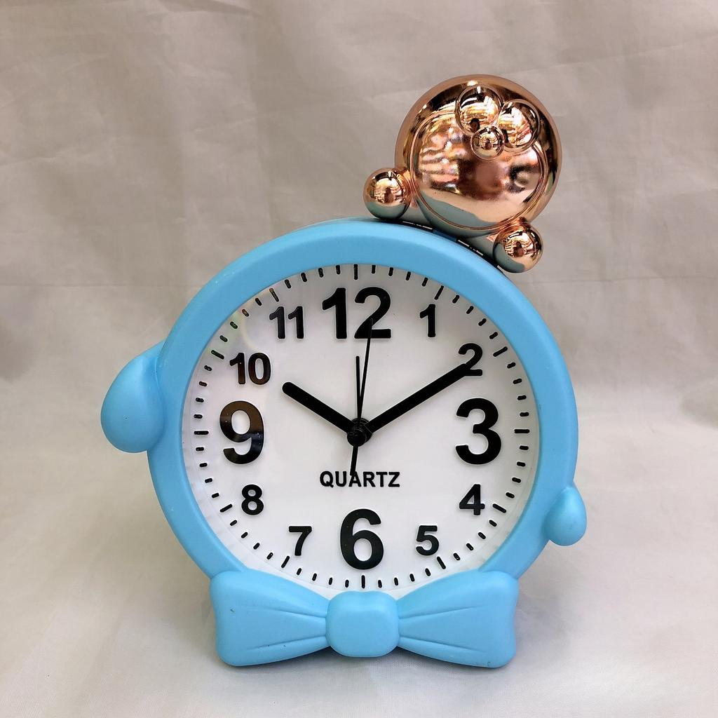 Creative and stylish cute cartoon head alarm clock Bedroom bedside children's sleep quartz clock