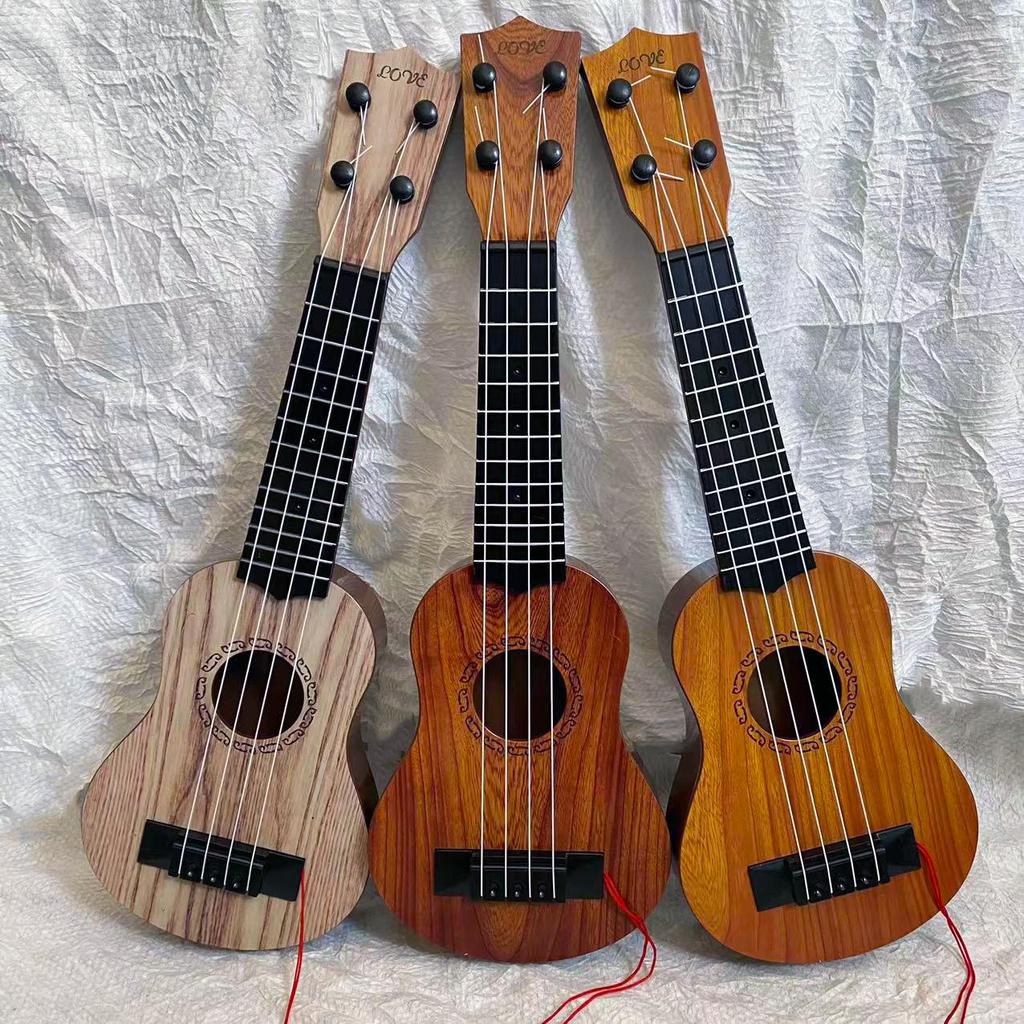 Children's Small Ukulele Guitar Toy - Functional Musical Instrument for Boys and Girls