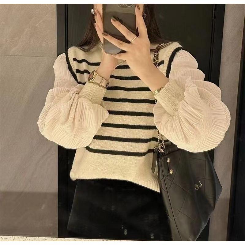 Autumn new black and white striped splicing fake two-piece sweater knitted sweater women's design bubble sleeve top