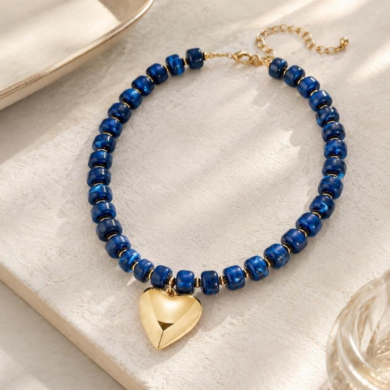 Adjustable Beaded Pendant Necklace with Rounded Resin Beads, Heart-Shaped Center Pendant, Extension Chain, and Lobster Clasp