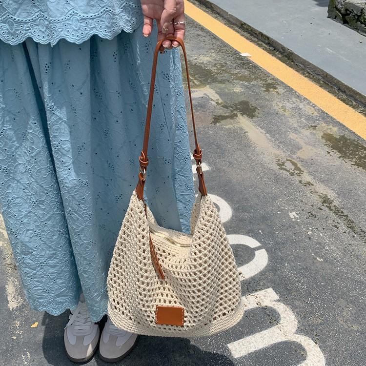 Woven Hollow Bag Women's 2025 New Summer Seaside Vacation Travel Tote Bag Beach Bag Shoulder Armpit Bag