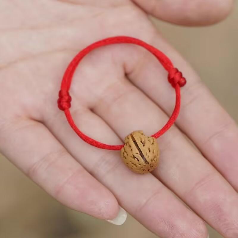 Bracelet en bois de pêche et noyer avec fil rouge pour tous les âges et tous les signes du zodiaque