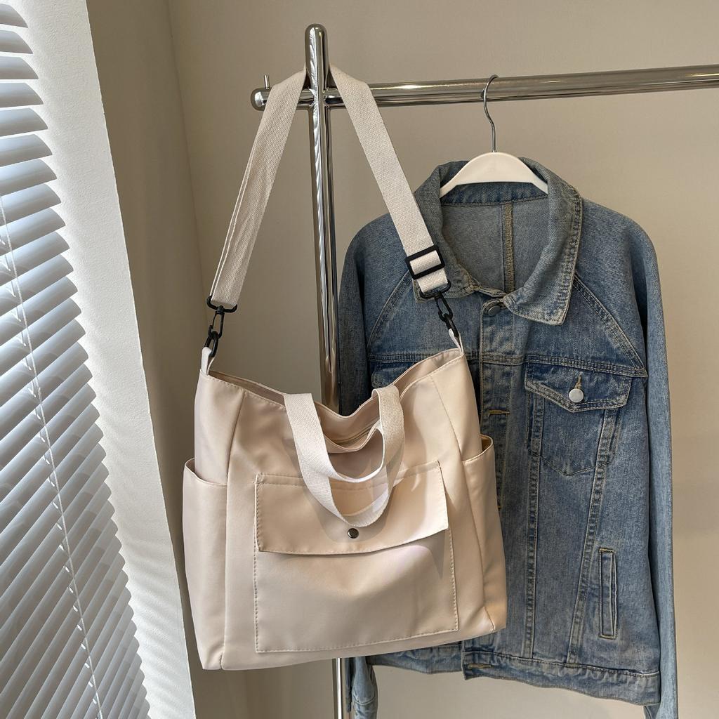 New Japanese tote bag women's commuter large-capacity shoulder bag casual texture college student class fashion armpit bag