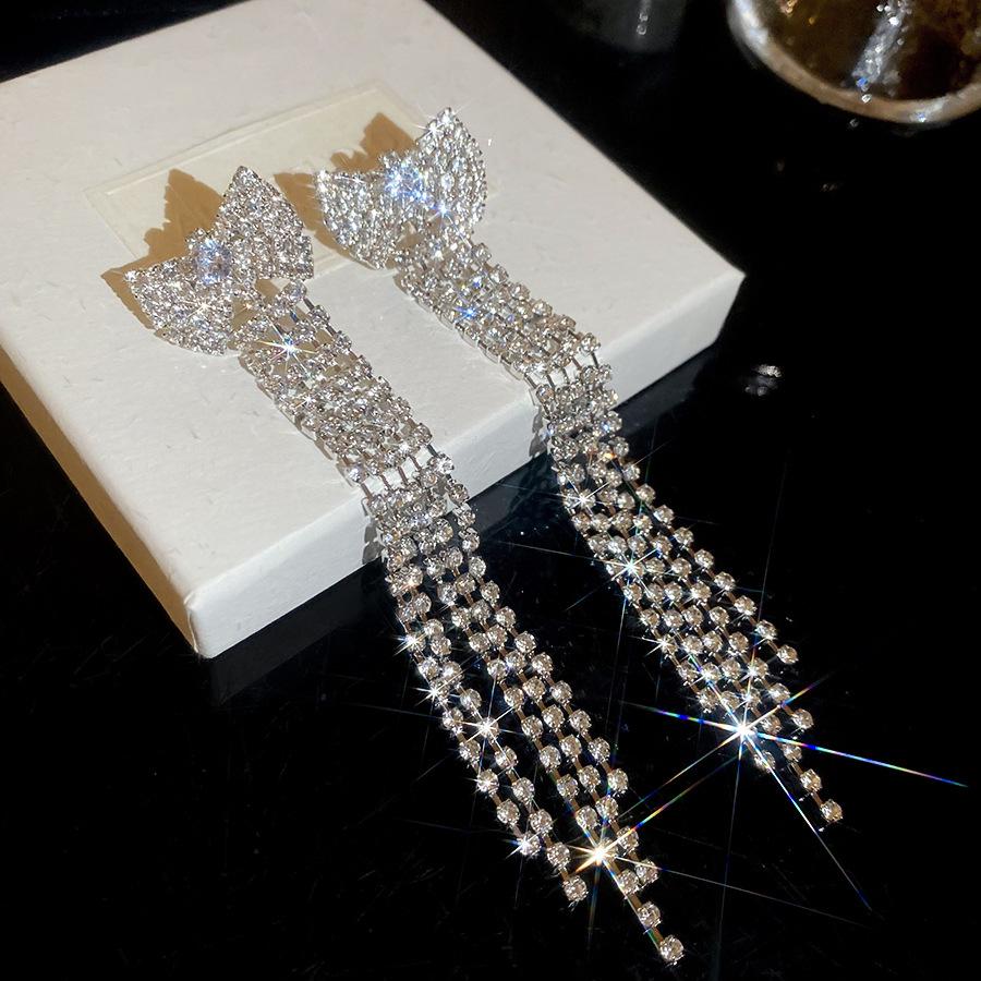 Elegant Silver Rhinestone Bow Tassel Earrings: Luxury Ear Studs for Women