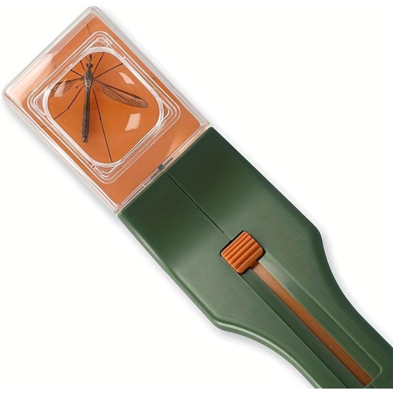 A handheld insect spotter with a transparent window for outdoor exploration. Gardening and nature research are ideal for backyard adventures