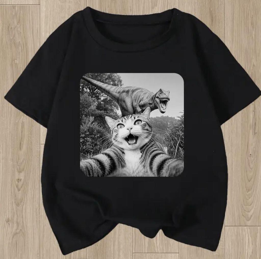 Funny Graphic Cat Riding Trex Dinosaur Novelty TShirt  Black Casual Streetwear Tee with Cartoon Dinosaur  Cat Design