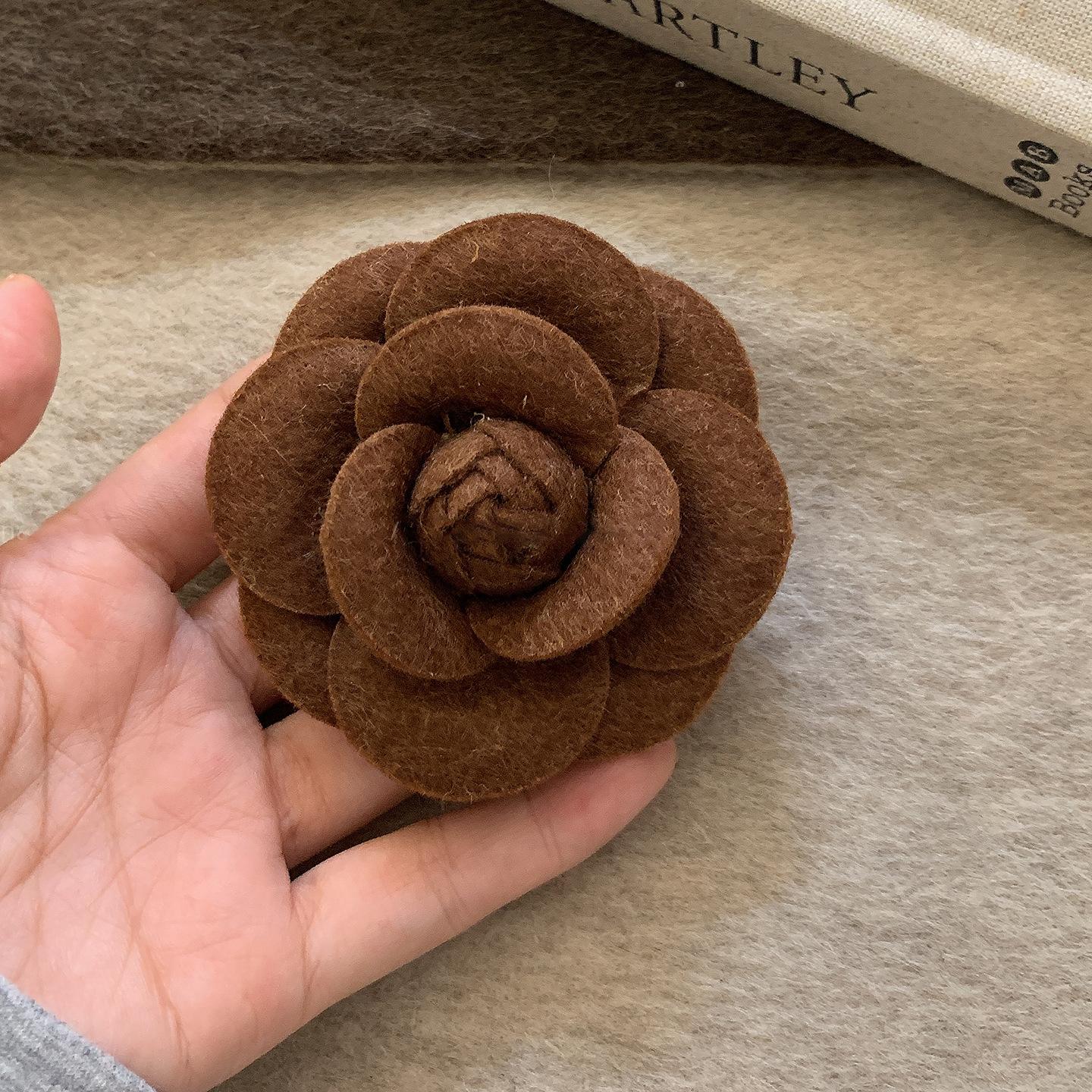 

Autumn and winter leather flocking flower brooch women s fashion pin simple and versatile temperament clothing accessories