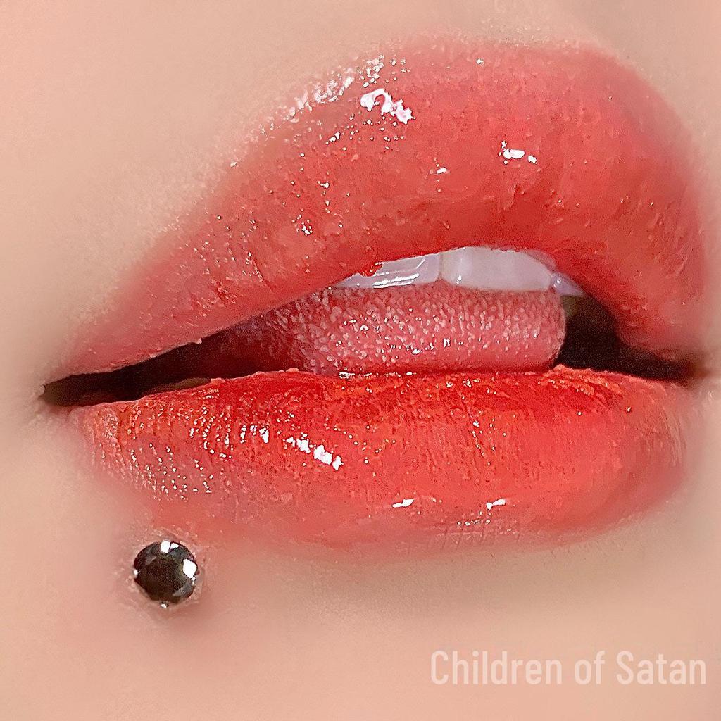 'Satan's Child: Luxury Diamond Lip and Ear Studs for Bold Women'