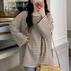 Trendy Korean-Style Women's Striped Long-Sleeve T-Shirt, Perfect for Early Spring Layering or Outerwear.