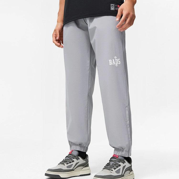 Li-Ning Badfive Basketball Series Letter Ankle-Tie Quick-Dry Cool Knit Sports Pants Men Bottoms Ultimate-Grey AYKT495-3