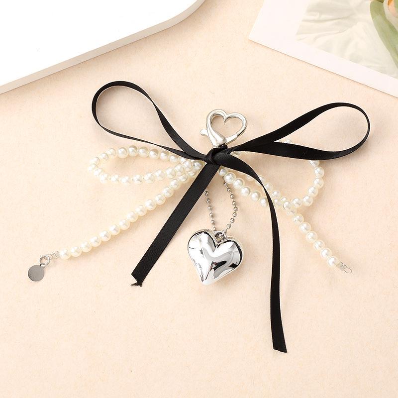 Creative Pearl Bow Pendant Keychain: Exquisite Gift Accessory for Bag or Phone Case