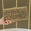 Lady Holding A Fashionable Evening Bag. Designer Water Droplet Chain Handbag for Ladies. Shoulder Bag for Ladies. Casually