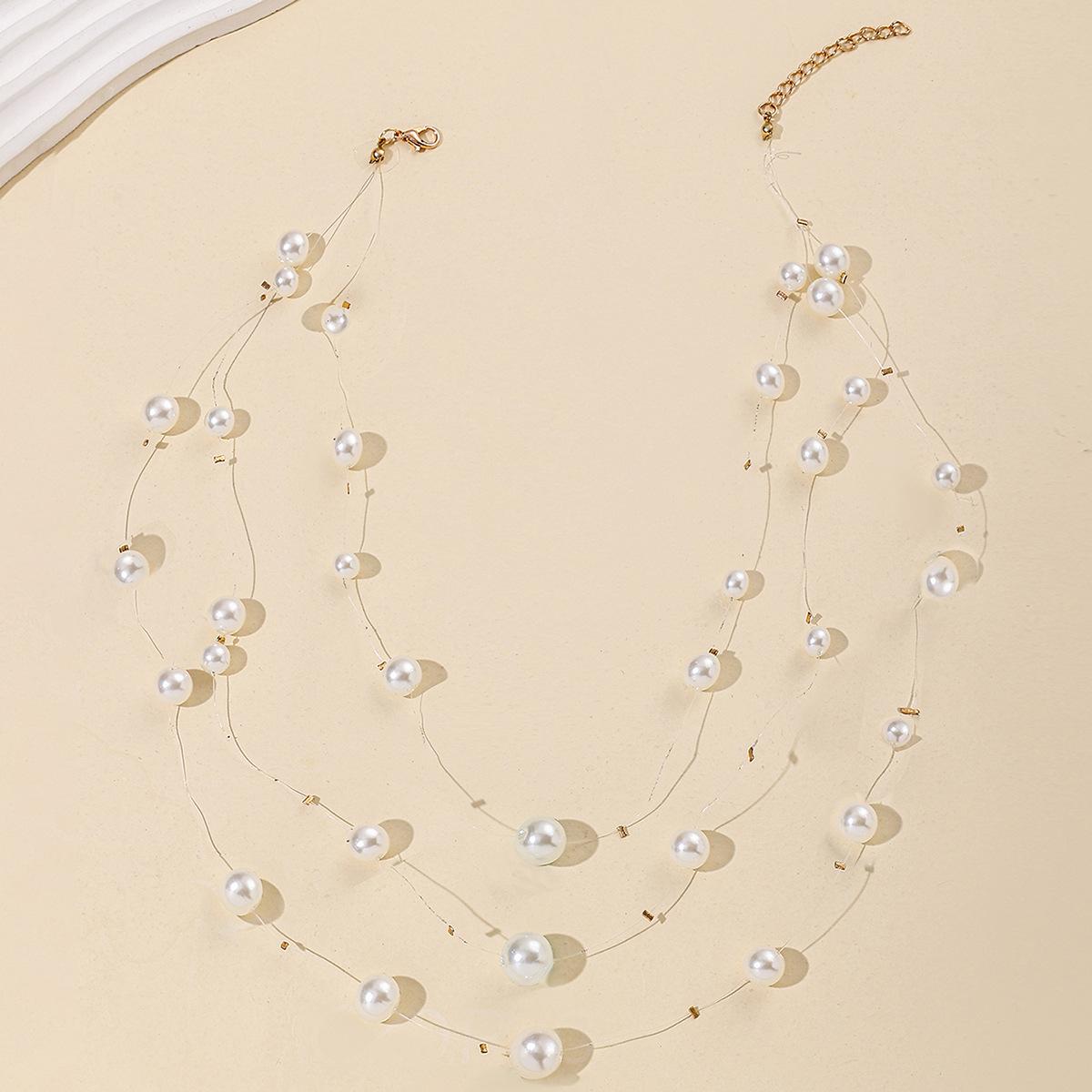 

Necklace pendant European and American jewelry light luxury versatile tassel imitation pearl sweater chain multi-layer stacked neck chain