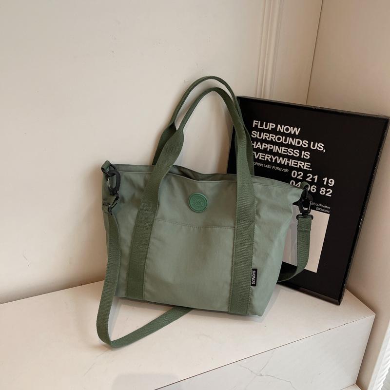 Simple literary cloth bag, women's work portable shoulder bag, large-capacity casual messenger tote bag