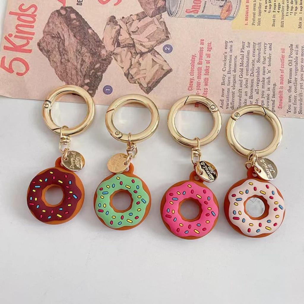Puzdro kompatibilné s AirTag, MAACKIA 2-dielna súprava, Roztomilý Air Tag Donut, Silikónový kryt, Kľúčenka,