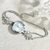 Elegante Damenarmbanduhr Blume Quarz-Armbanduhr Strass-Quarz-Uhr Business-Anlass