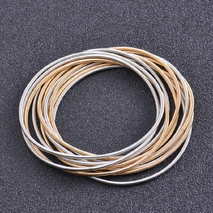 Infällbar Armband Kolstål Trådarmband Smycken Fjäderarmband Spolset