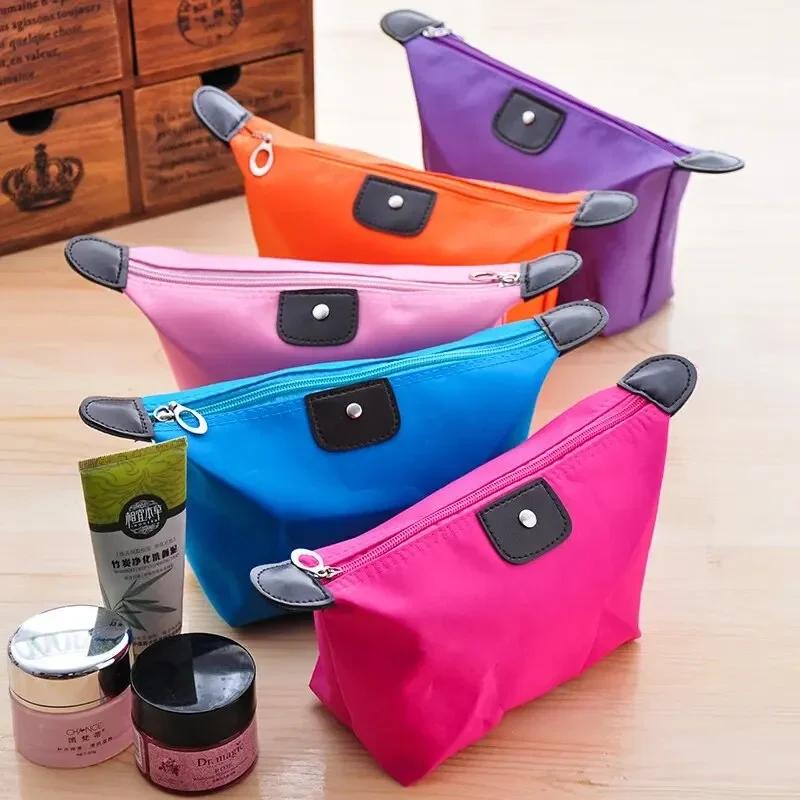 

Candy color foldable dumpling-shaped cosmetic bag, waterproof nylon material, portable storage toiletry bag, suitable for women
