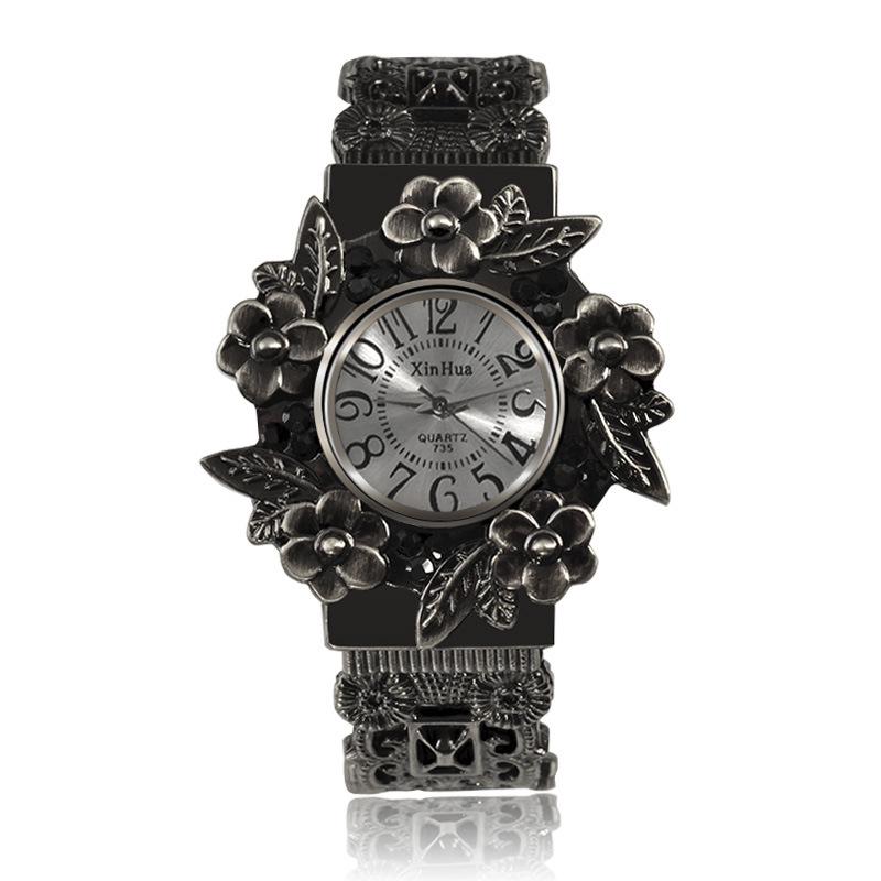 Retro Carved Women's Quartz Bangle Watch
