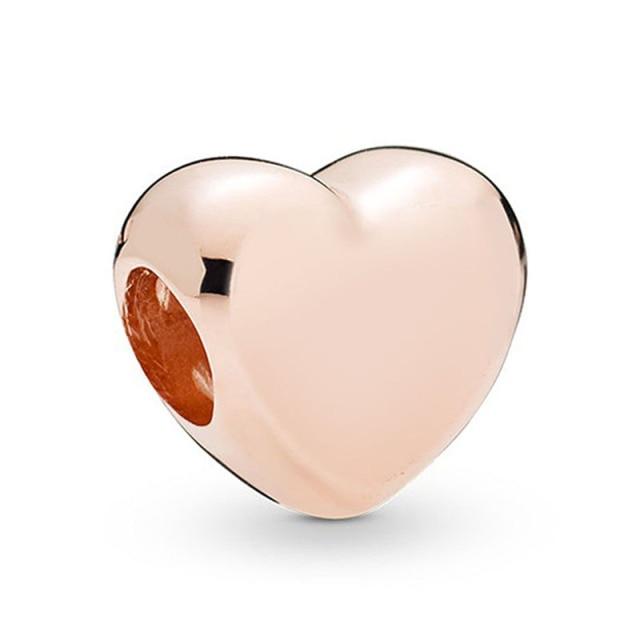 Подвеска из розового золота с цветком в виде листа и короны в виде сердца — фото 29