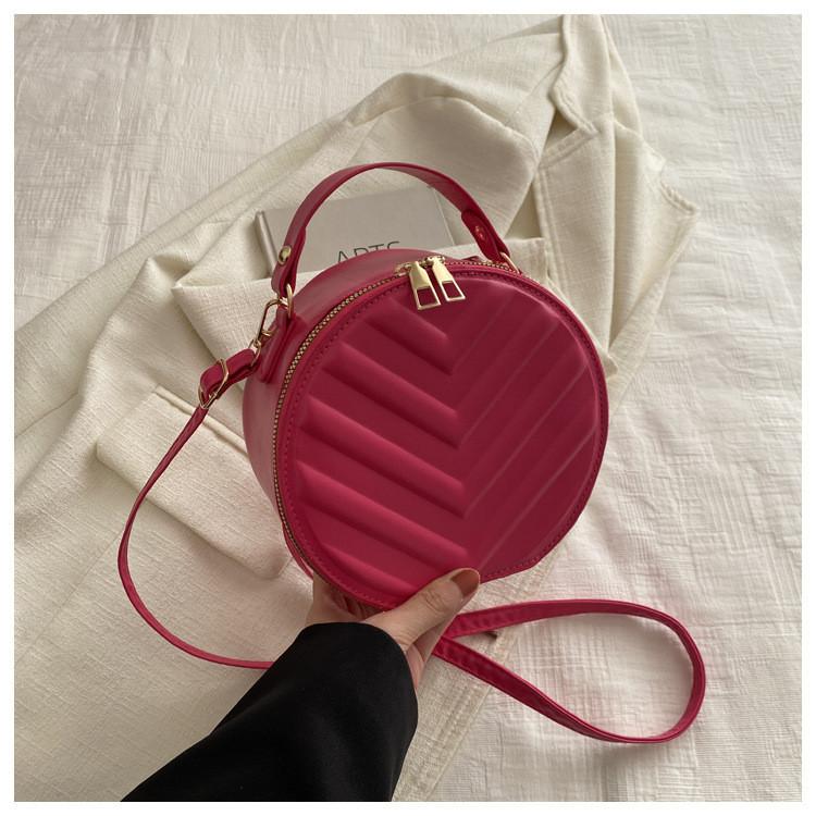 

Trendy Urban Round Bag With Chic Car Line Detailing And Soft Material троянди рожеві кольору