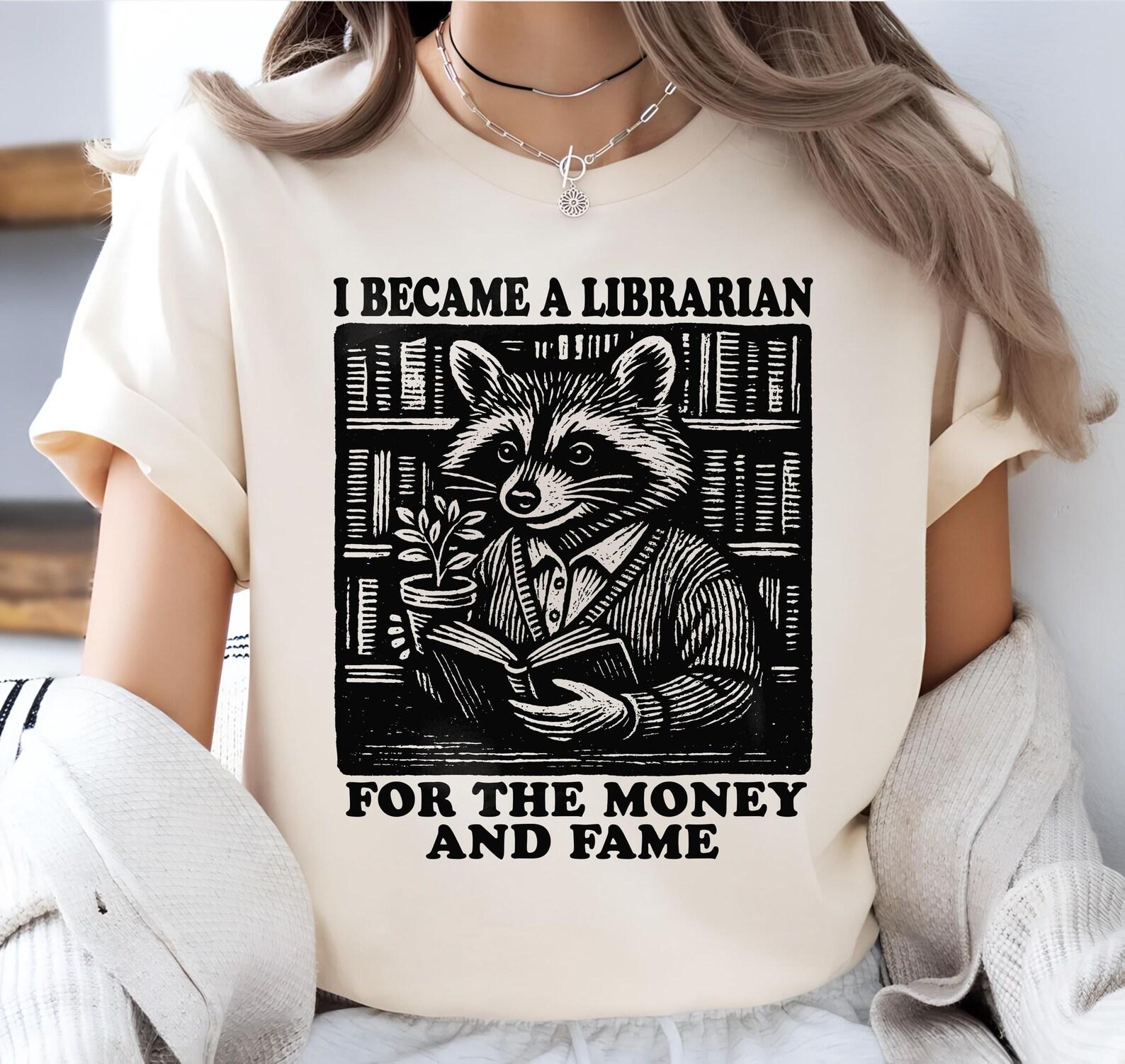 i became a librarian for the money and fame shirt, Librarian Raccoon Shirt, Librarian gift, funny Raccoon Meme, Linocut Style T-Shirt 2XL