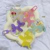 Jelly Balloon Dog Keychain: Cute, Colorful Puppy Pendant for Phone or Bag.