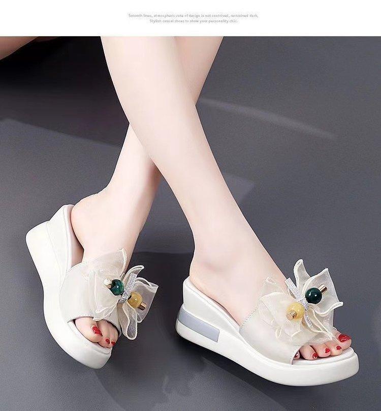 

Wedge heel slippers women s summer wear 2025 new bow fashion non-slip one-word heightening thick-soled sandals 40