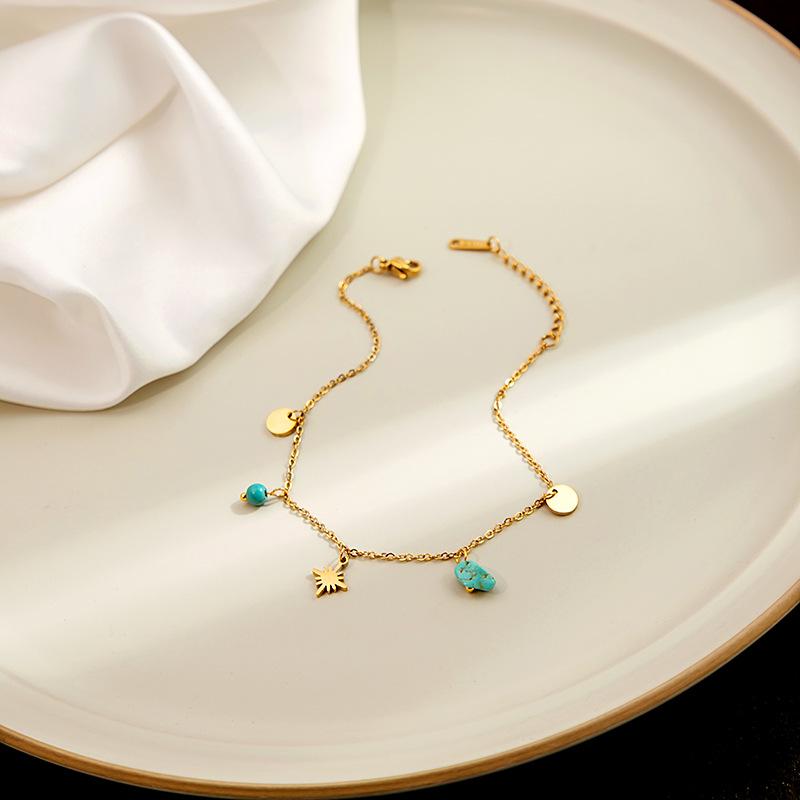 Cheville Disque Géométrique Turquoise Métallique avec Étoile à Huit Branches et Motif Papillon – Accessoire de Pied Style Niche