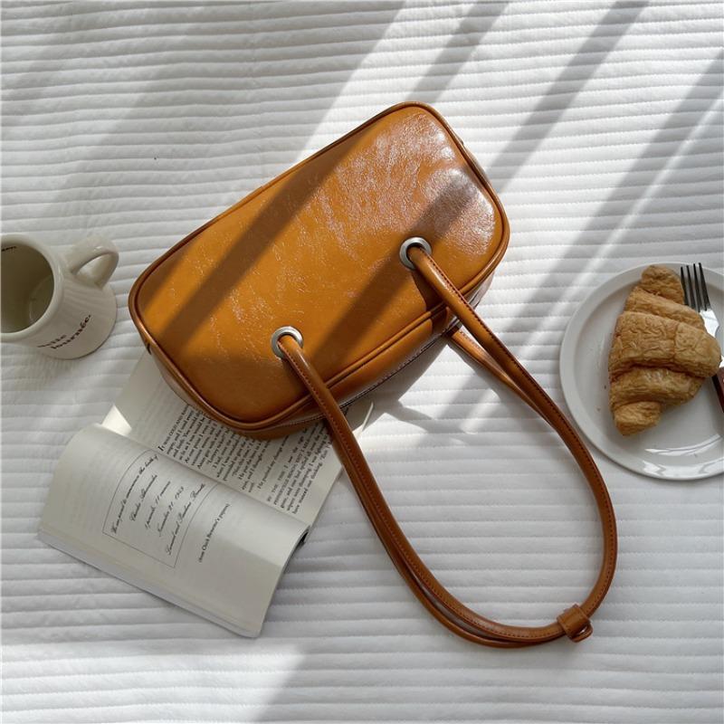 

Simple shoulder bag Large capacity versatile handbag Women s niche design Fashion underarm bag Premium sense коричневий