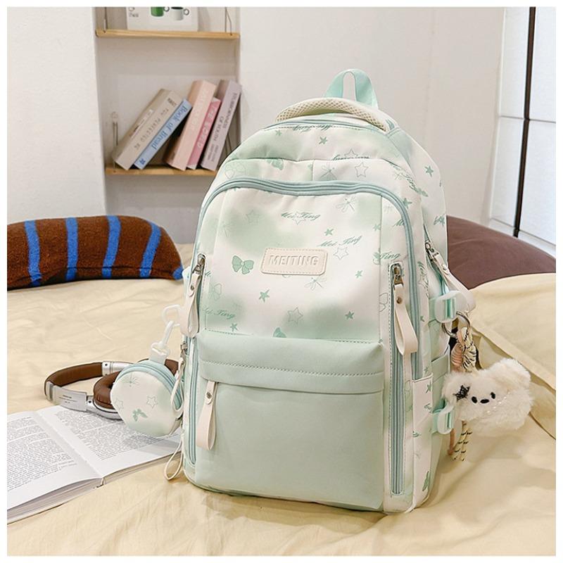 The new Japanese ins high-value, fresh, sweet and cute butterfly graffiti backpack, lightweight backpack for junior high school students