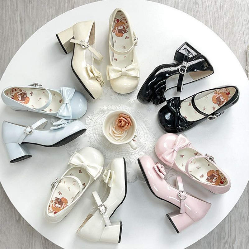 Sweet and cute lolita girl medium and high heel Mary Jane shoes round head bow light mouth one-word buckle belt jk single shoes