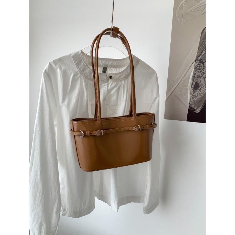 

Versatile tote bag women s creative niche design fashionable commuter bag women s large-capacity leather shoulder bag women коричневый