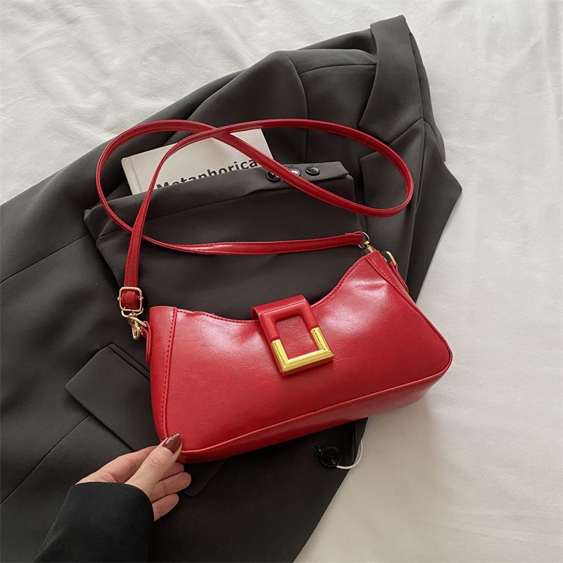 

Нишевая дизайнерская женская сумка 2025 новая ретро-модная сумка через плечо с высоким чувством универсальная сумка-багет под мышкой красный