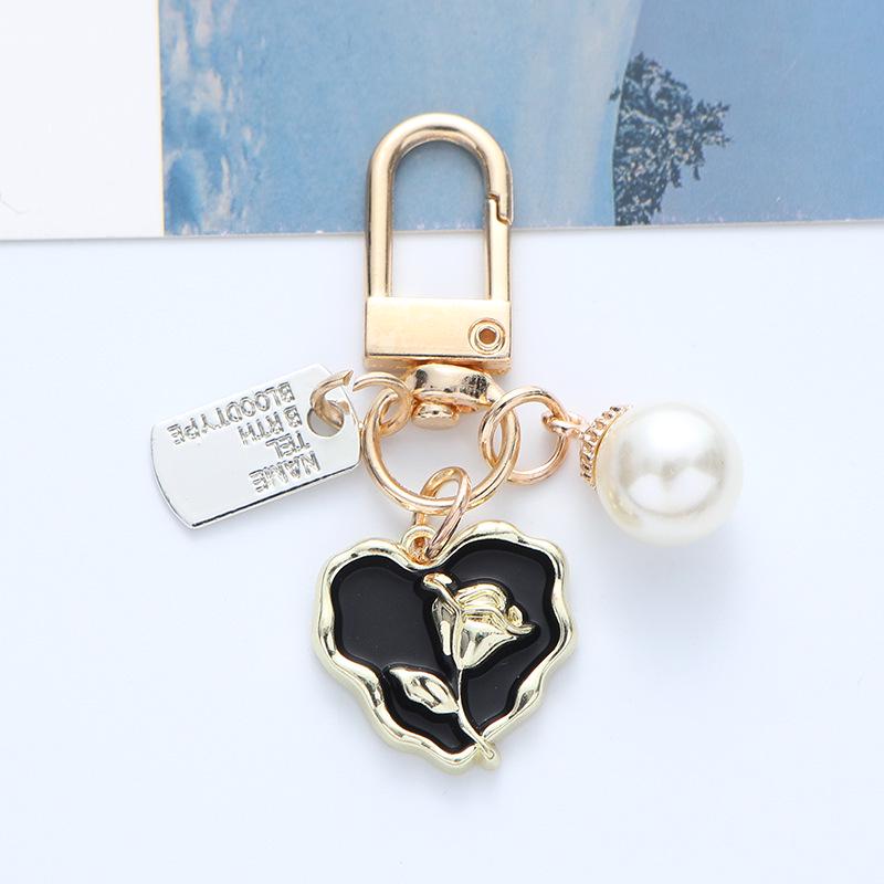 Creative Rose Heart Metal Keychain Pendant with Pearl Accent - Stylish Ornament for Earphone Case or Bag чёрный