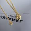 Neue Herz Perlen Strass Choker Halskette mit Doppel C Logo und Diamantkette