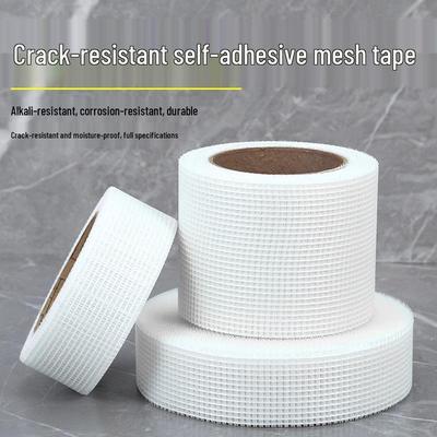 Sklolaminátová protiprasklinová samolepicí mřížková páska na stěny - 10 cm