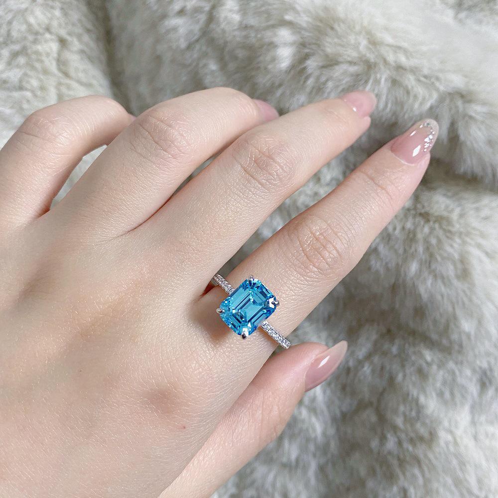 Aquamarine Emerald-Cut Ring In 925 Sterling Silver with Pave Diamonds, Plated In PT950 Gold.