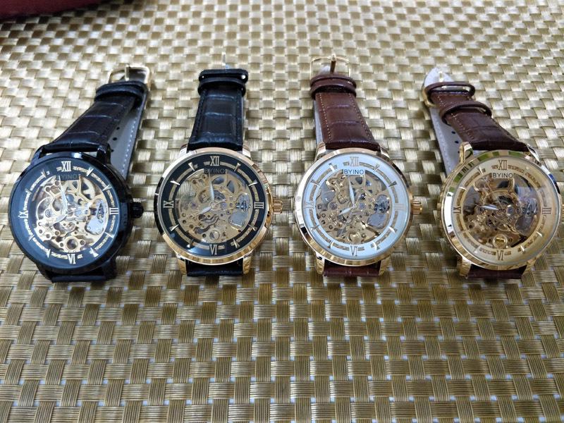BYINO Herren Skelett Automatikuhr Chronograph mit transparentem Boden, weißen Zeigern, Leder- oder Mesh-Armband