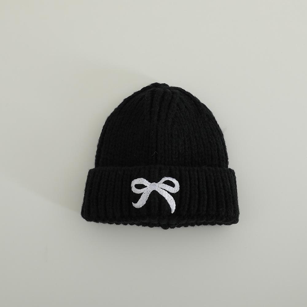 

Корейська інс дитяча вовняна шапка осінь і зима бант універсальна дитяча в язана шапка з вушками дівчача вовняна шапка холодна шапка 47-52cm [2-6 years old] чорний