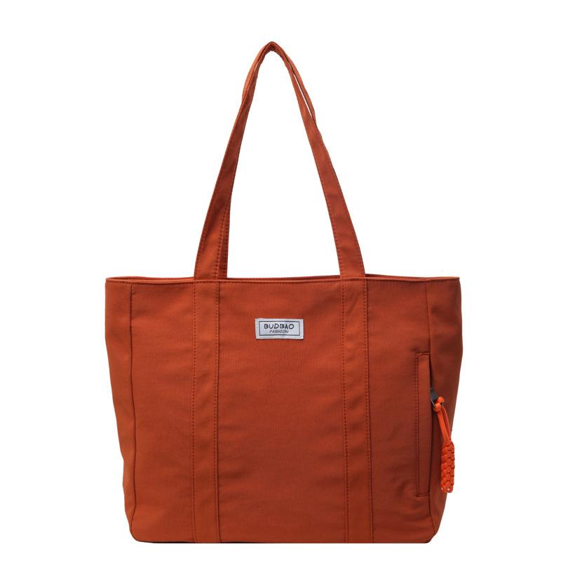 

New women s nylon large-capacity fashion shoulder portable messenger bag casual women s bag помаранчевий