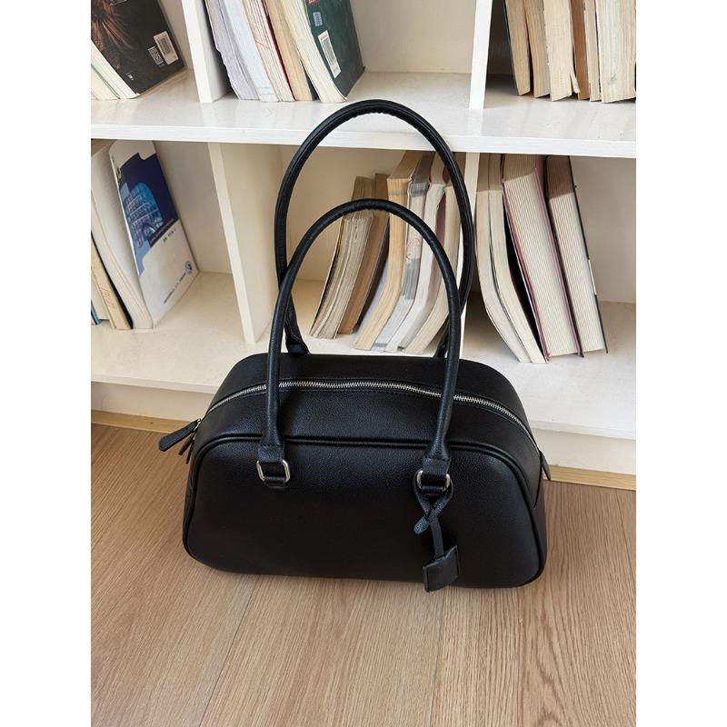 

Niche bowling bag women s new trendy retro armpit bag large capacity portable shoulder briefcase