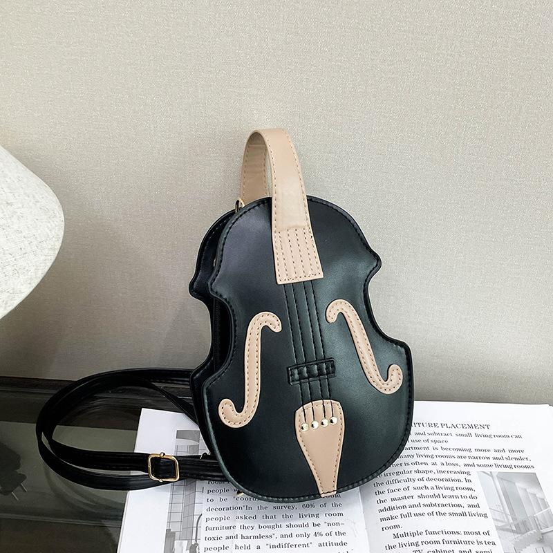 

Guitar bag female personality ins casual versatile oily skin niche design high sense shopping commuter messenger bag