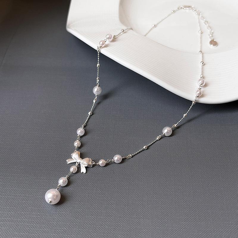 

2025 Silver Bow Pearl Pendant Necklace: Luxury Choker Design for Women