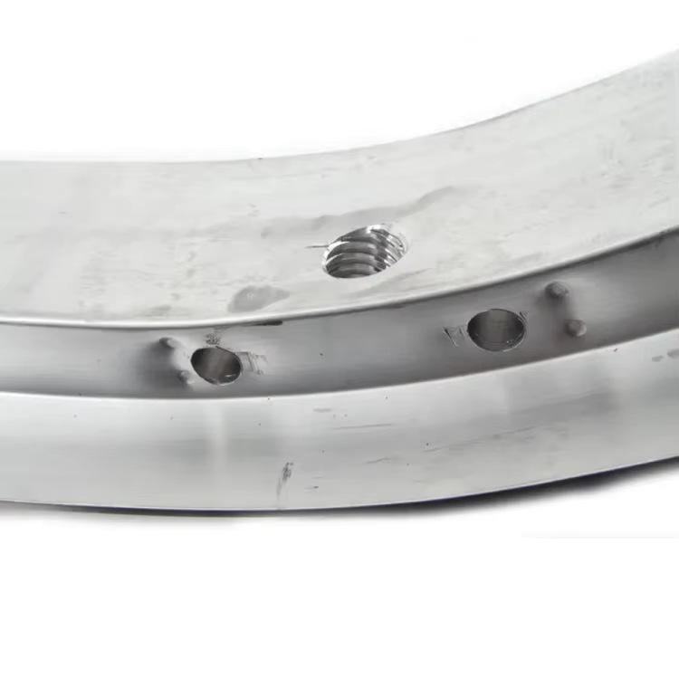 The 51117301577 is a front bumper top bracket for the MINI F55.