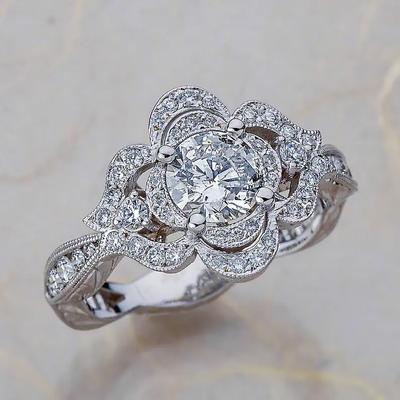 Beliebter ausgehöhlter Ring mit Blumenform und eingelegtem glänzendem Strassstein-Zirkon, vergoldet mit Silber überzogener Damenmodeschmuck